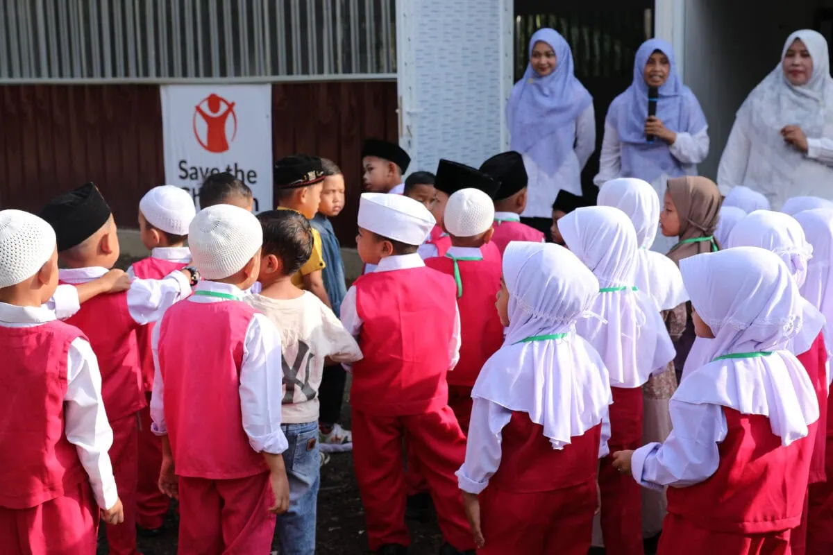 2026-07 ER Sumatra Ihsan and friends on the first day of school in kindergarten TLS in Aceh Tamiang - 3